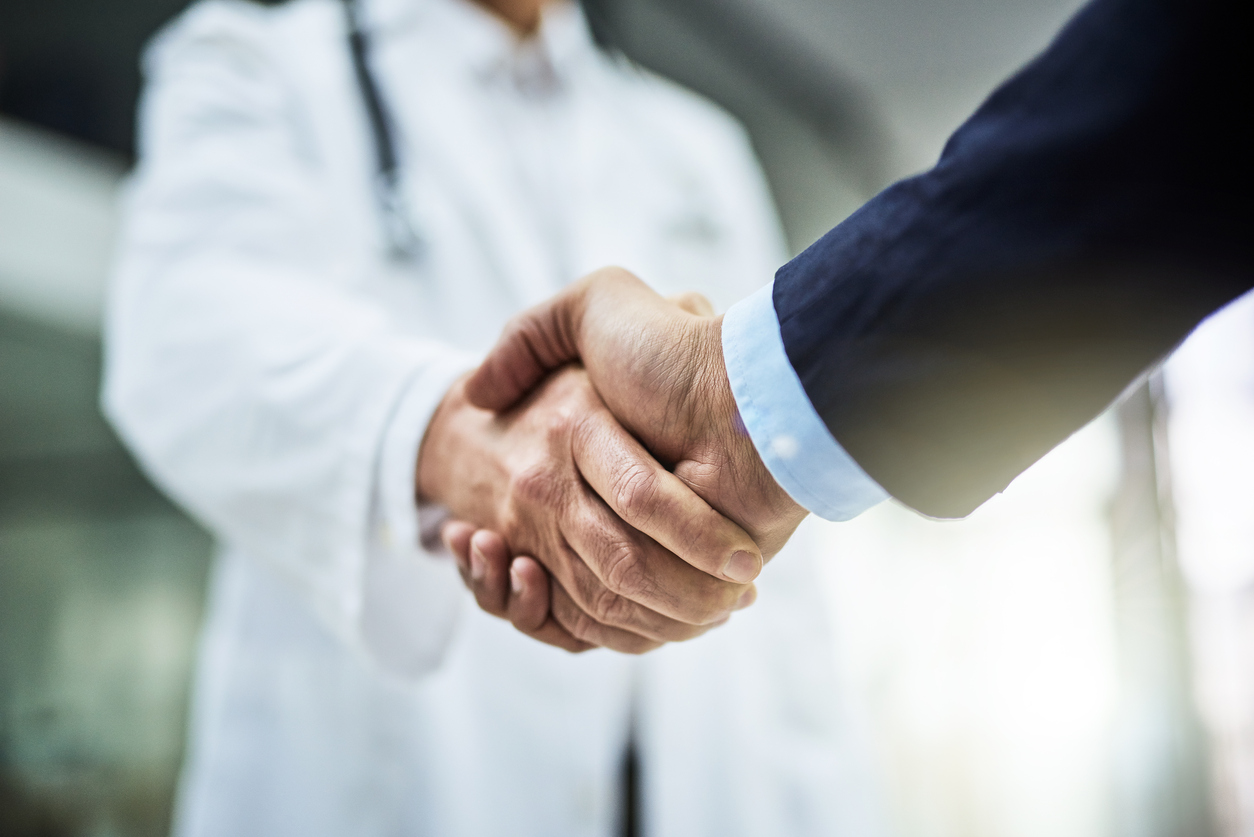 doctor shaking hands